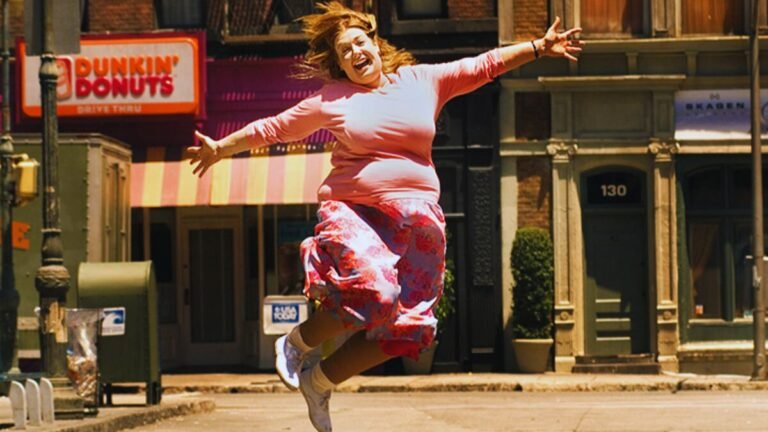 An obese girl jumping in the air